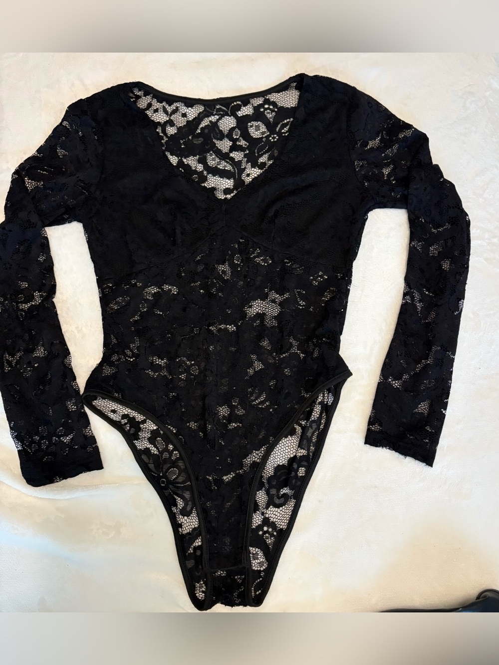 Black Lace Long sleeve Women’s Body Suit Size L. Has lining around bust area